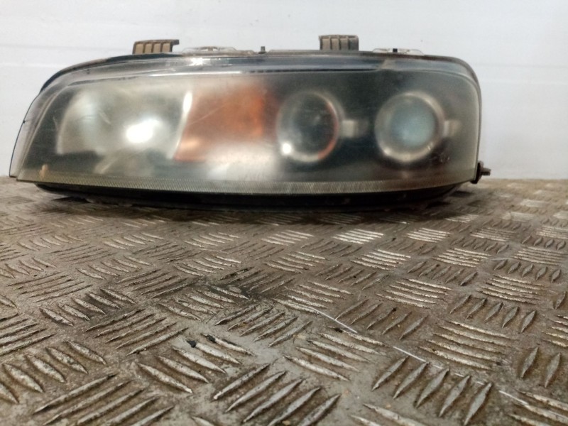 Recambio de faro izquierdo para fiat punto berlina (188) referencia OEM IAM 89100957  