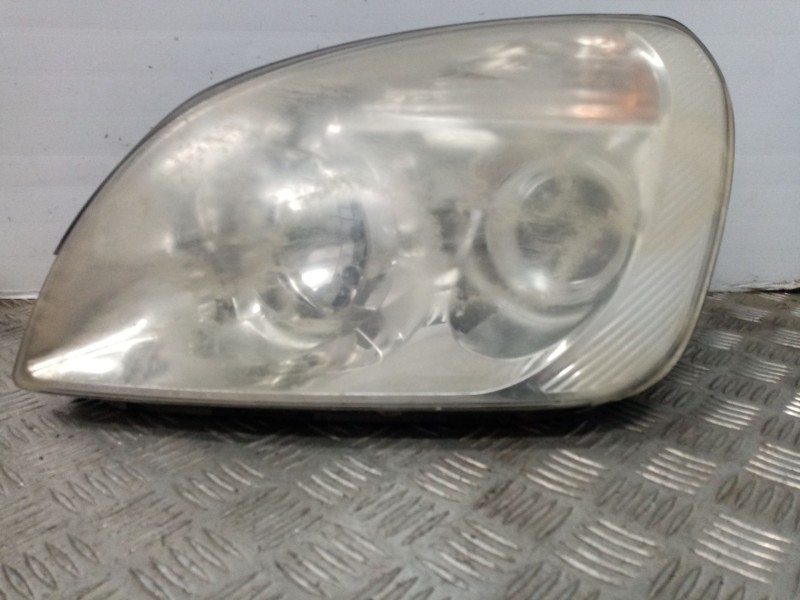 Recambio de faro izquierdo para kia carens (un) referencia OEM IAM 921011D020  