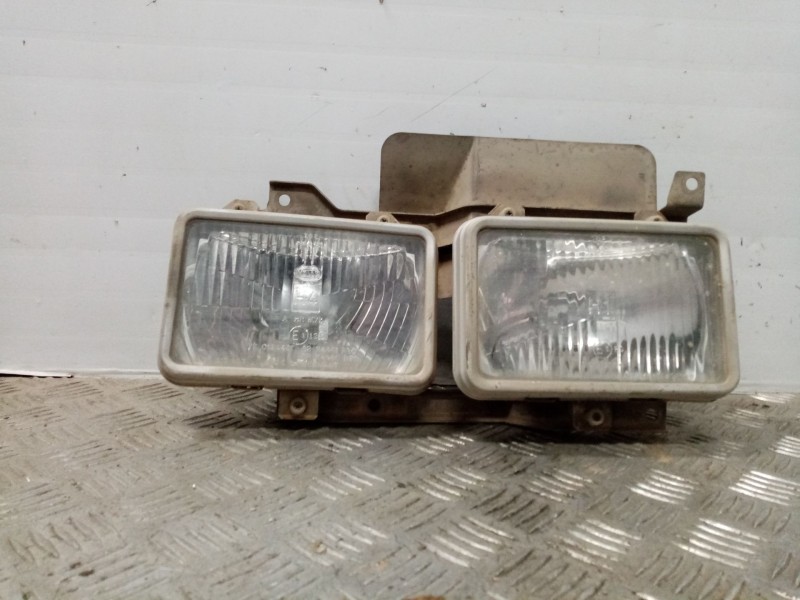 Recambio de faro derecho para nissan vanette (c 220) vanette transporter referencia OEM IAM   