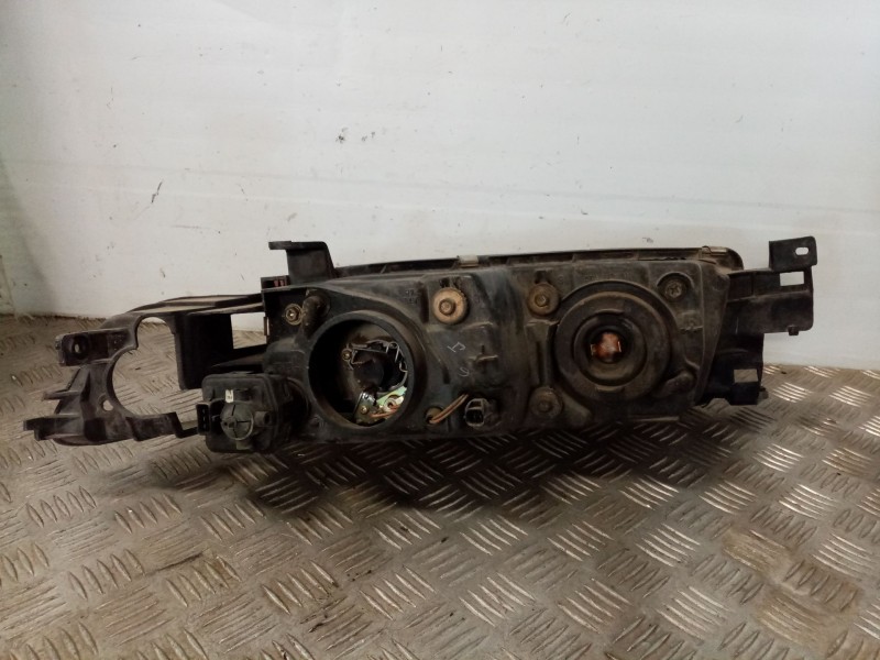 Recambio de faro izquierdo para mitsubishi galant familiar (ea0) referencia OEM IAM MR325943  