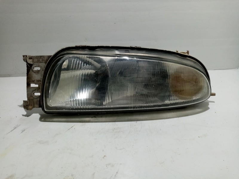 Recambio de faro izquierdo para ford fiesta berlina referencia OEM IAM 0301049201  
