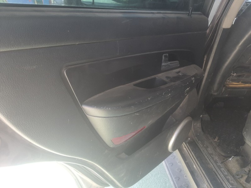 Recambio de guarnecido puerta trasera izquierda para ssangyong rexton referencia OEM IAM   