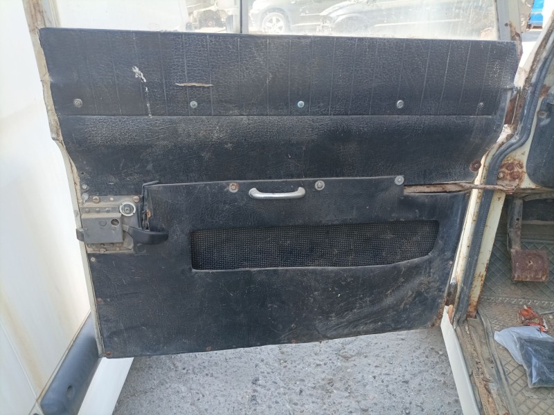 Recambio de guarnecido puerta delantera izquierda para land rover 88 diesel referencia OEM IAM   