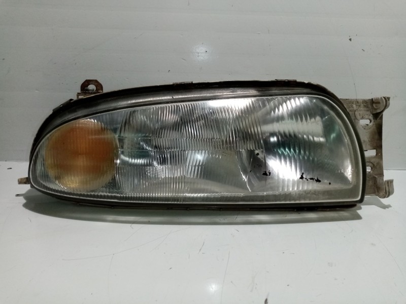 Recambio de faro izquierdo para hyundai lantra familiar (rd) referencia OEM IAM 9210429521  