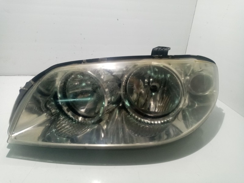 Recambio de faro izquierdo para fiat punto berlina (188) 1.2 cat referencia OEM IAM 46849385  