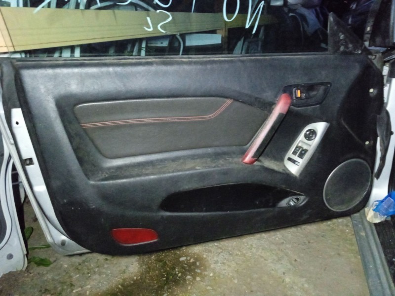 Recambio de guarnecido puerta delantera izquierda para hyundai coupe ii (gk) 1.6 16v referencia OEM IAM 823012C030  