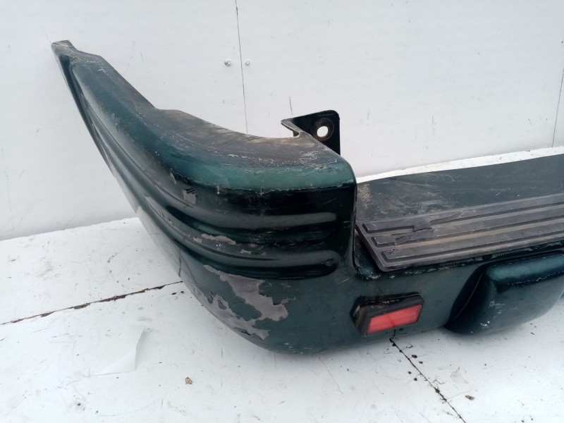 Recambio de paragolpes trasero para jeep cherokee (j) referencia OEM IAM 4883506AA  