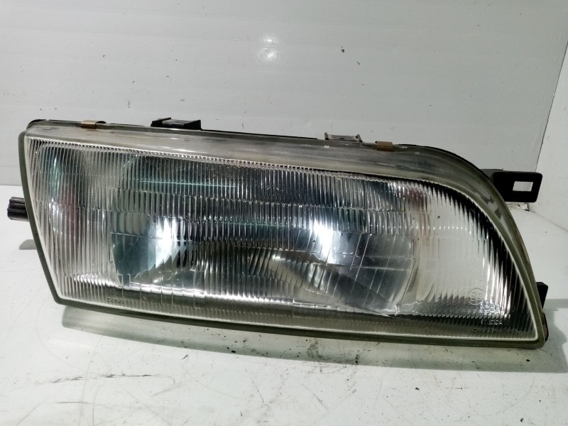 Recambio de faro derecho para nissan almera (n15) referencia OEM IAM 260102N325  