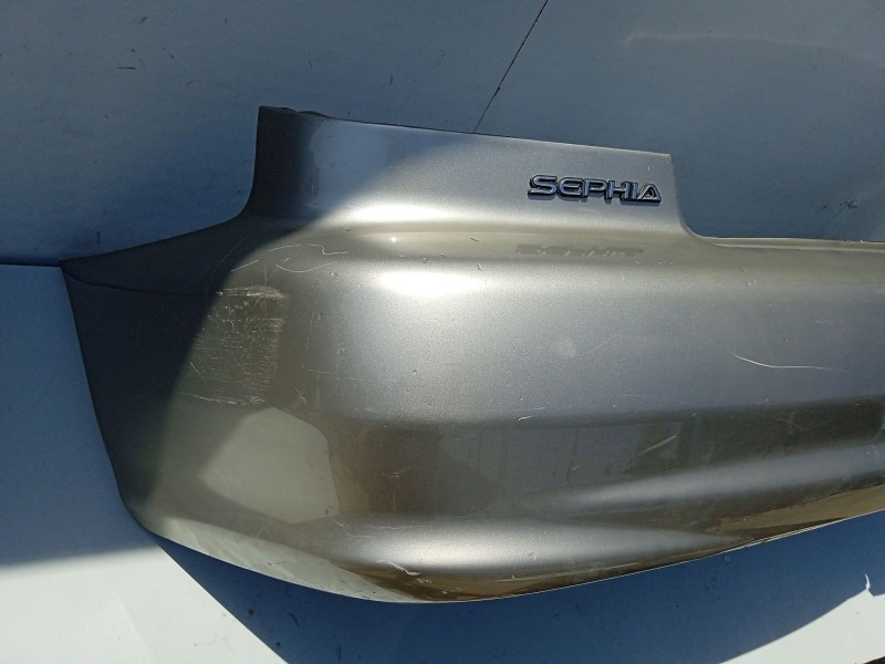 Recambio de paragolpes trasero para kia sephia sedán (fa) 1.5 i referencia OEM IAM 0K2A150220BXX  