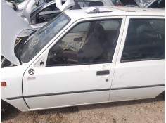 Recambio de puerta delantera izquierda para peugeot 205 furgoneta/hatchback 1.8 d referencia OEM IAM 9002E9  