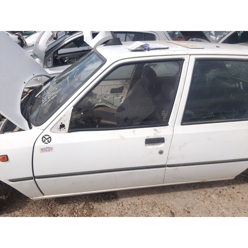 Recambio de puerta delantera izquierda para peugeot 205 furgoneta/hatchback 1.8 d referencia OEM IAM 9002E9  