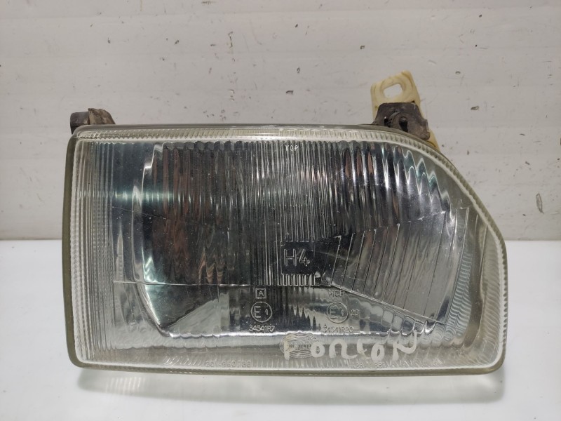 Recambio de faro derecho para ford orion referencia OEM IAM 1058189  