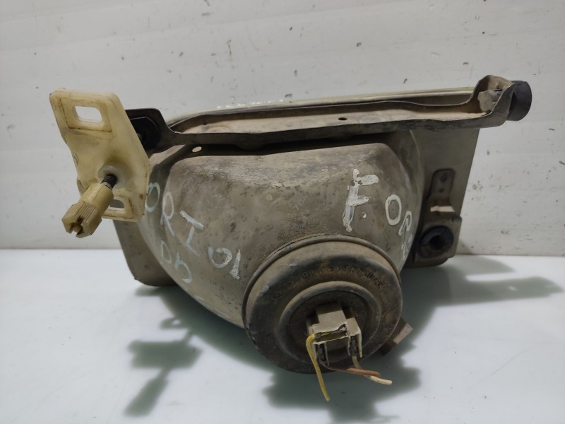 Recambio de faro derecho para ford orion referencia OEM IAM 1058189  