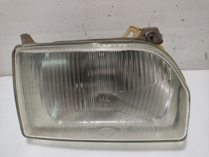 Recambio de faro derecho para ford orion referencia OEM IAM 1058189  