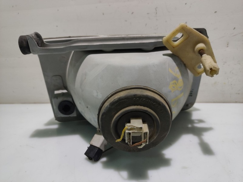 Recambio de faro izquierdo para ford orion referencia OEM IAM 1058202  