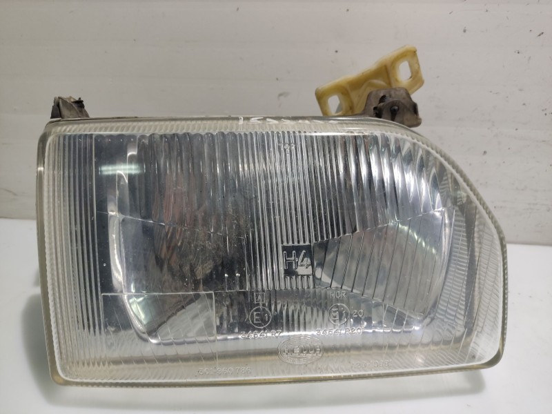 Recambio de faro derecho para ford orion referencia OEM IAM 1058191  