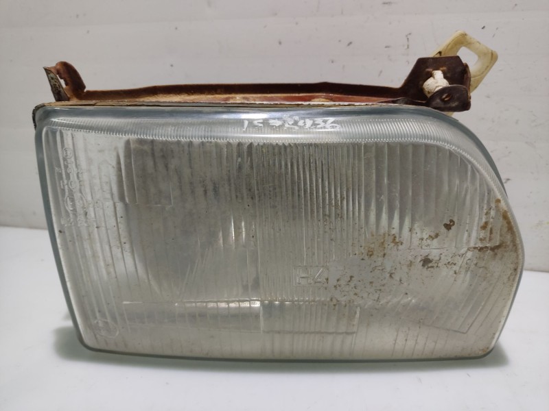 Recambio de faro derecho para ford orion referencia OEM IAM 1058189  