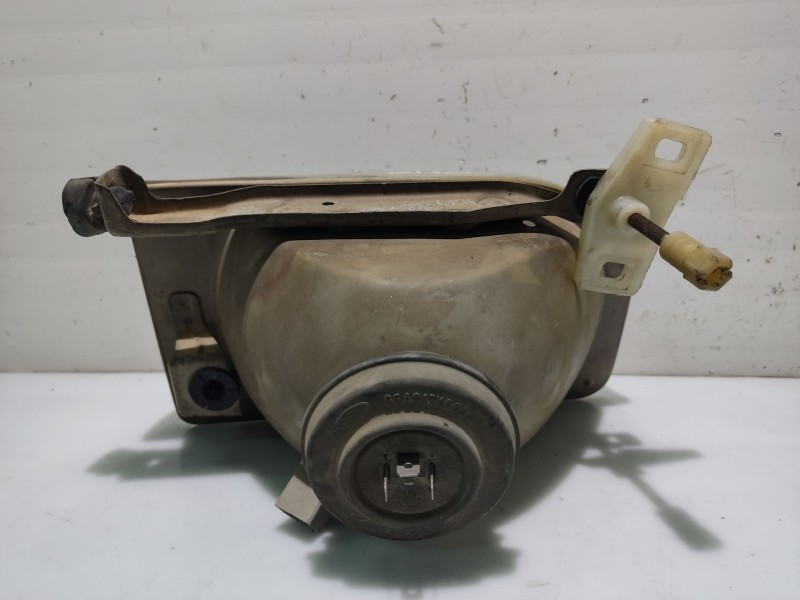 Recambio de faro izquierdo para ford orion referencia OEM IAM 1058202  