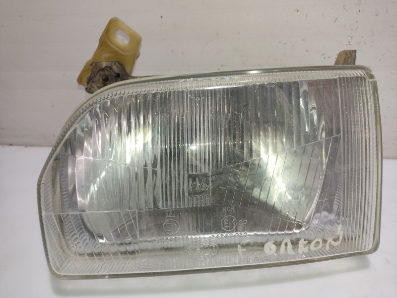 Recambio de faro izquierdo para ford orion referencia OEM IAM 1058202  
