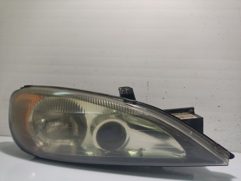 Recambio de faro derecho para nissan primera berlina (p11) 2.0 turbodiesel cat referencia OEM IAM 260109F602  