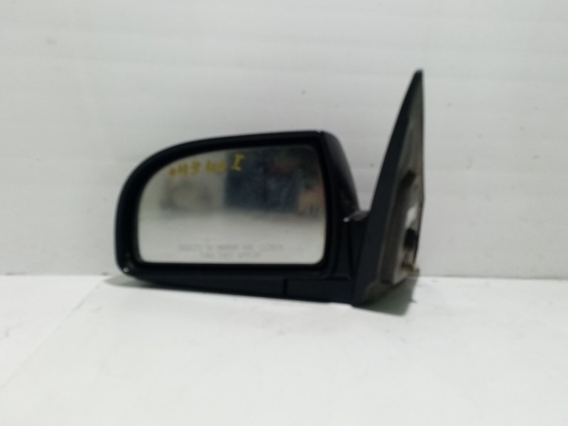 Recambio de retrovisor izquierdo para kia carens 2.0 turbodiesel cat referencia OEM IAM 0K2FL69185  