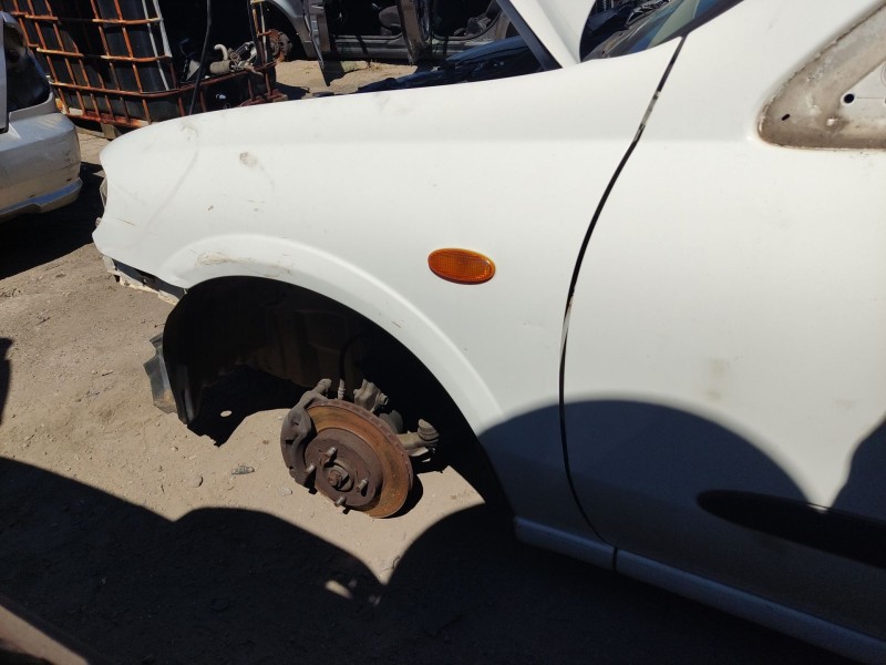 Recambio de aleta delantera izquierda para nissan almera ii hatchback (n16) 1.5 referencia OEM IAM 631014M630  