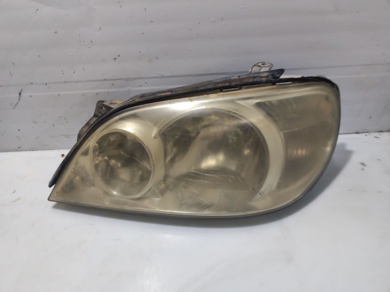 Recambio de faro izquierdo para kia carnival ii referencia OEM IAM 0K55251040B  