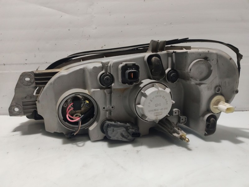 Recambio de faro derecho para kia carnival ii referencia OEM IAM 0K55251030B  