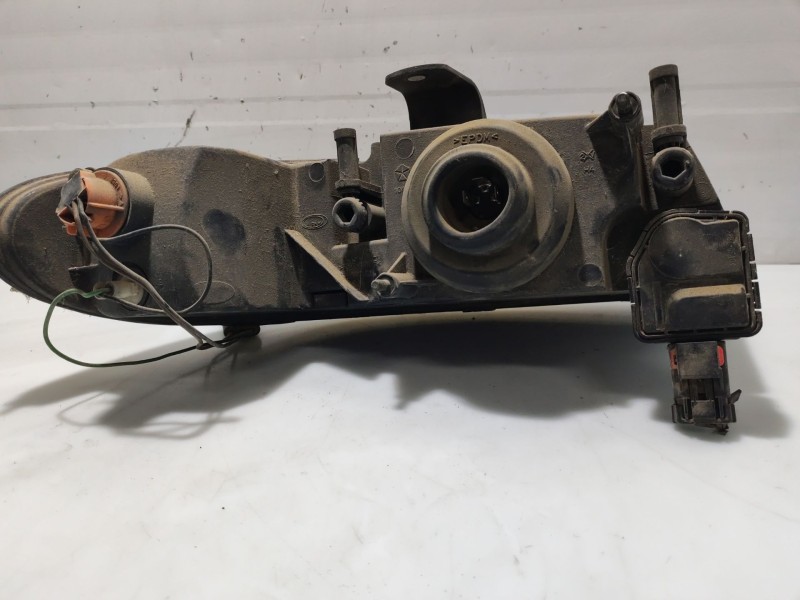 Recambio de faro izquierdo para chrysler voyager (gs) referencia OEM IAM 4897389AB  