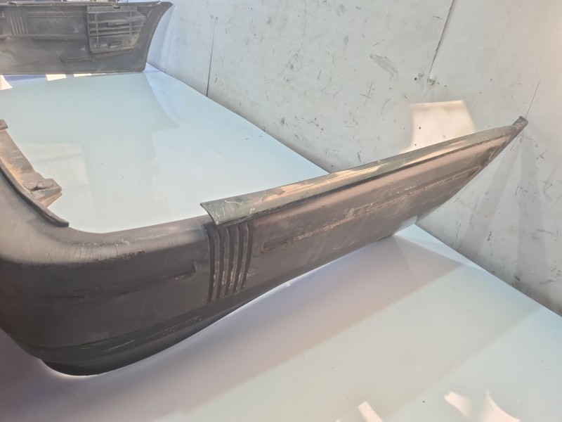Recambio de paragolpes trasero para volvo serie 940 berlina/familiar 2.3 cat referencia OEM IAM 1358600  