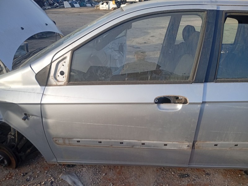 Recambio de puerta delantera izquierda para hyundai getz (tb) 1.1 referencia OEM IAM 760031C020  