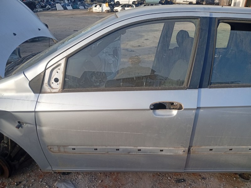Recambio de puerta delantera izquierda para hyundai getz (tb) 1.1 referencia OEM IAM 760031C020  