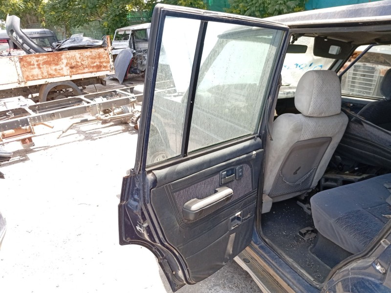 Recambio de puerta trasera izquierda para ssangyong korando referencia OEM IAM   