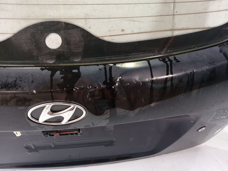 Recambio de porton trasero para hyundai accent (mc) referencia OEM IAM 737001E220  