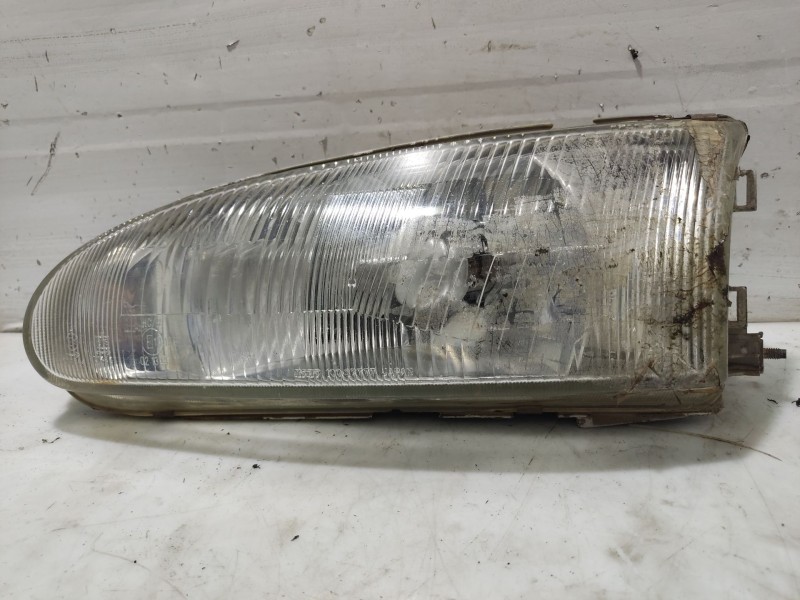Recambio de faro izquierdo para mitsubishi colt (ca0) referencia OEM IAM MB929207  
