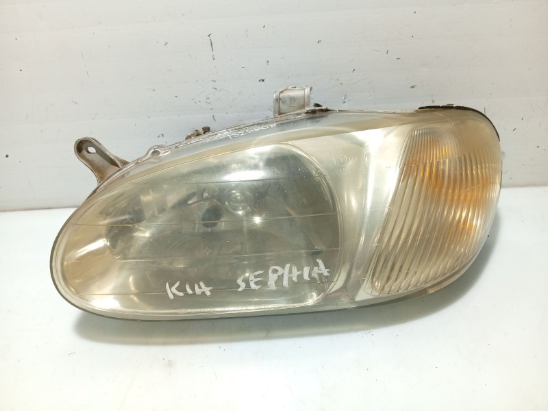 Recambio de faro izquierdo para kia sephia referencia OEM IAM 0K2AC51040A  