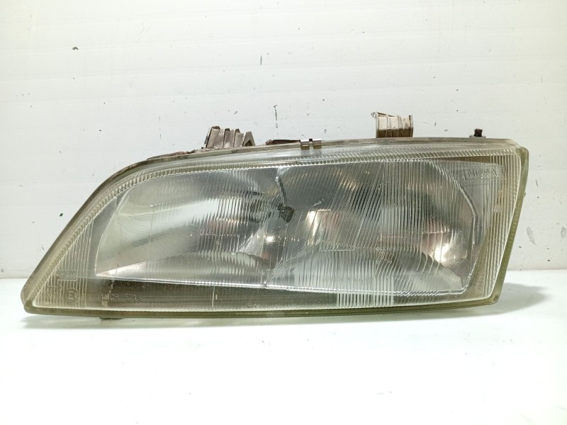 Recambio de faro izquierdo para nissan primera (p11) 2.0 16v referencia OEM IAM 260602F925  