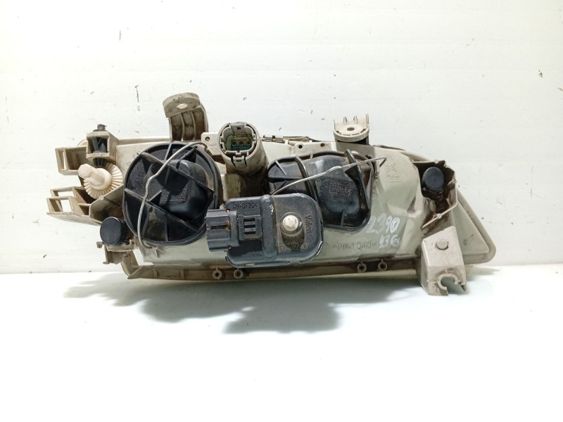 Recambio de faro izquierdo para nissan primera (p11) 2.0 16v referencia OEM IAM 260602F925  