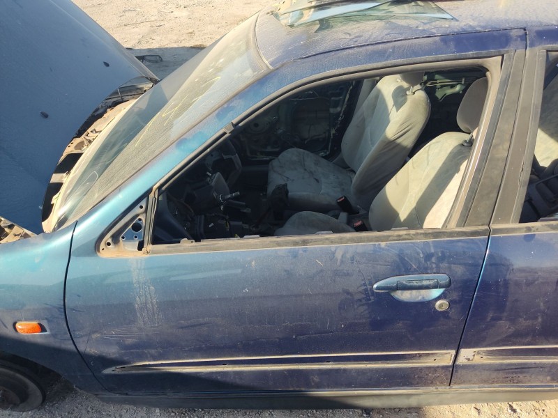 Recambio de puerta delantera izquierda para nissan primera hatchback (p11) 2.0 td referencia OEM IAM 801012J036  