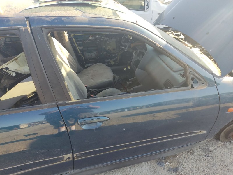 Recambio de puerta delantera derecha para nissan primera hatchback (p11) 2.0 td referencia OEM IAM 801002J036  