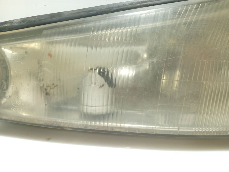 Recambio de faro izquierdo para ford mondeo ii (bap) 1.8 td referencia OEM IAM 1056278  