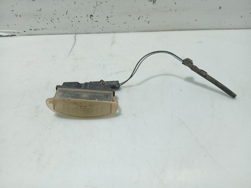 Recambio de piloto matricula para renault clio iii business referencia OEM IAM 7700410754  