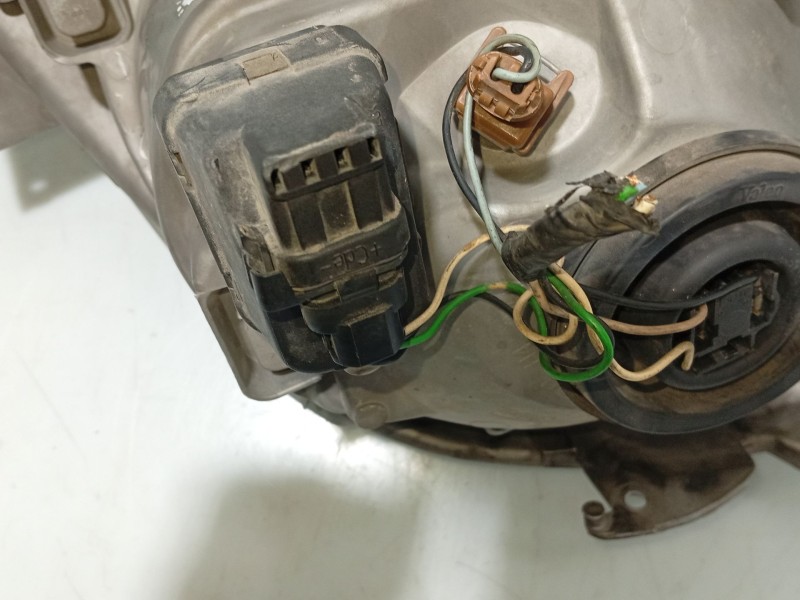 Recambio de faro izquierdo para nissan primastar autobús (x83) dci 80 referencia OEM IAM 2606000QAE 7700311371 91165719