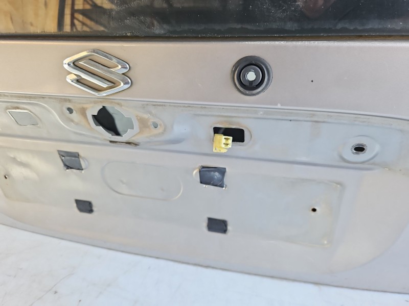 Recambio de porton trasero para suzuki ignis rm (mh) referencia OEM IAM 6910086G00  