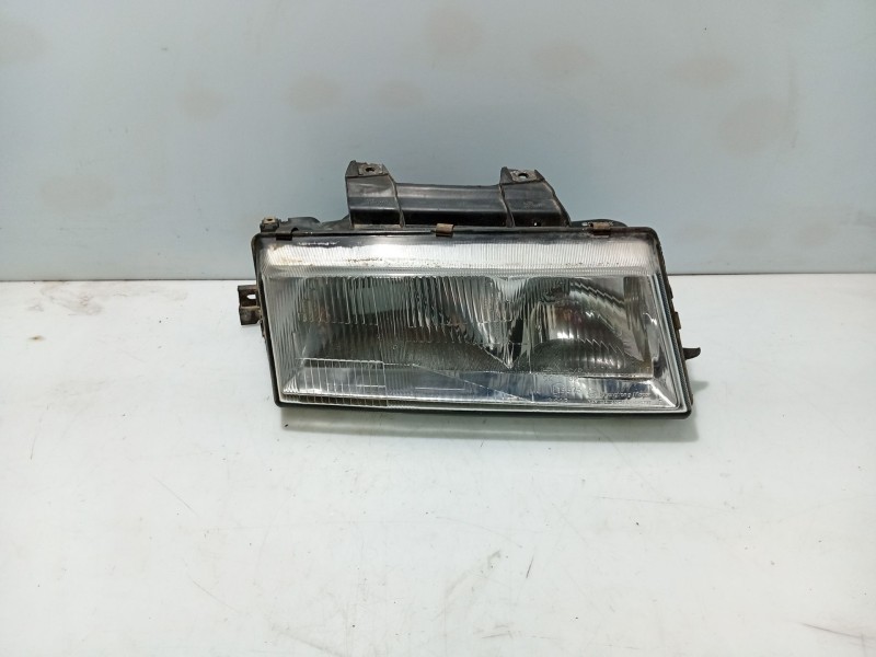 Recambio de faro derecho para ssangyong musso (fj) 2.9 td referencia OEM IAM   