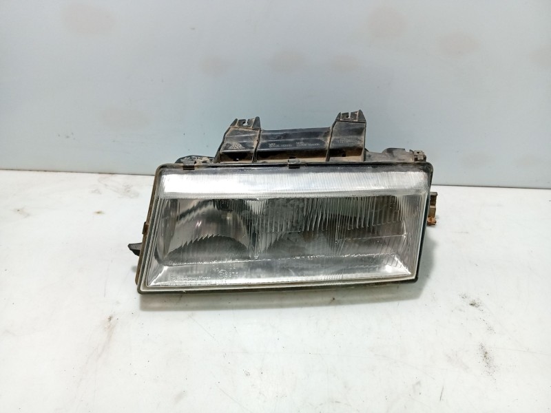 Recambio de faro izquierdo para ssangyong musso (fj) 2.9 td referencia OEM IAM 8310105300  