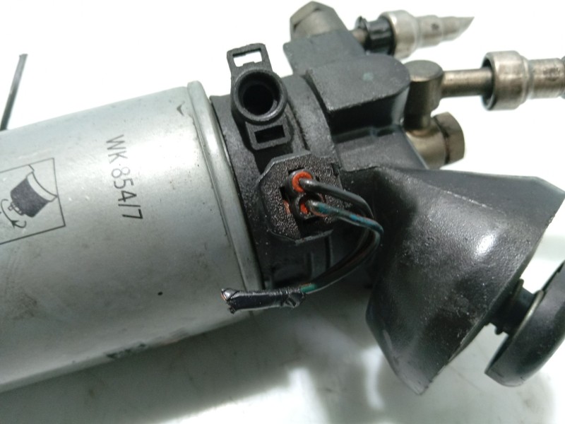 Recambio de portafiltro gasoil para chrysler voyager iv (rg, rs) 2.5 crd referencia OEM IAM   