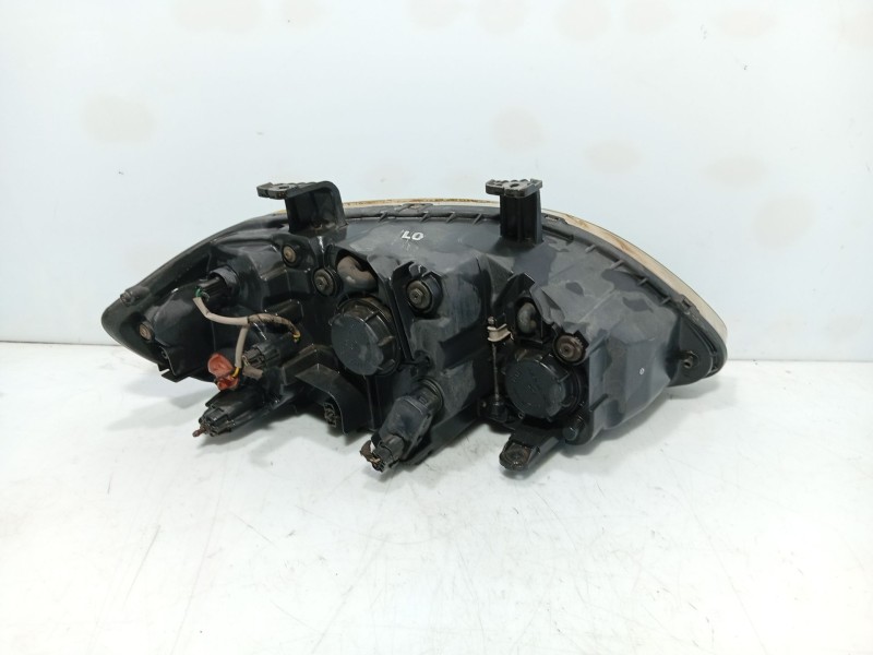 Recambio de faro izquierdo para ssangyong rodius i 2.7 xdi referencia OEM IAM 8310121201  