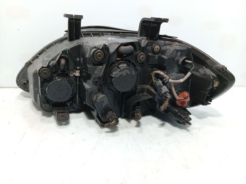 Recambio de faro derecho para ssangyong rodius i 2.7 xdi referencia OEM IAM 8310221205  
