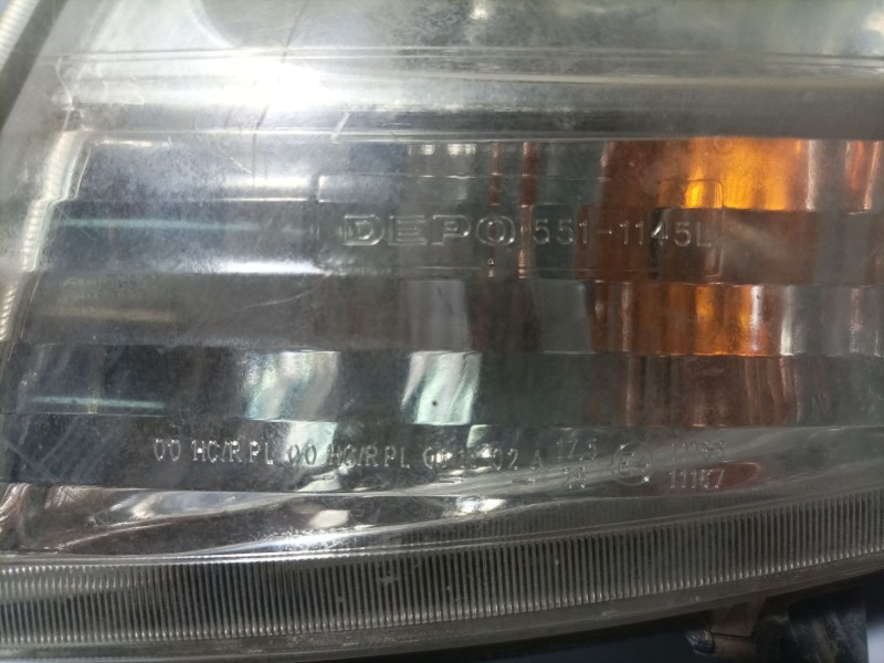 Recambio de faro izquierdo para renault kangoo referencia OEM IAM 8200236590  